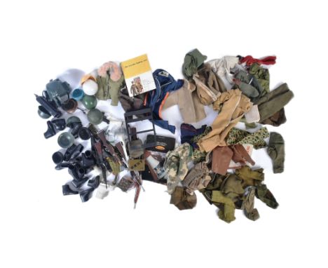 A large collection of vintage Palitoy Action Man action figure uniform clothing to include military boots, jackets, trousers,