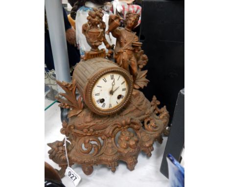 An old early French gilded mantle clock