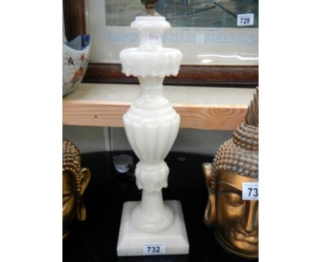 A heavy tall alabaster table lamp