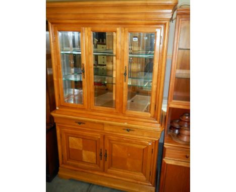 A light mahogany glazed bookcase
