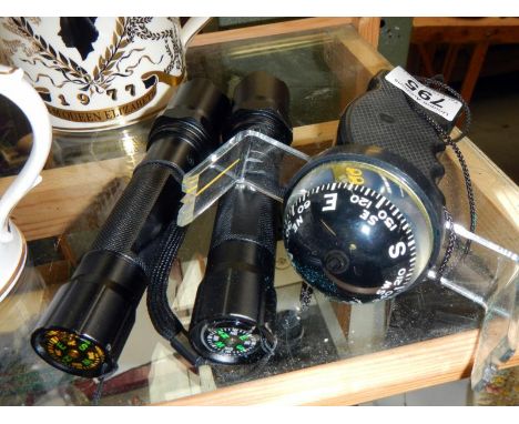 2 torch compasses &amp; 1 hand compass