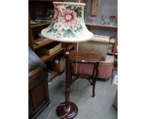 A mahogany standard lamp