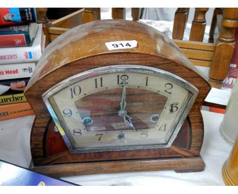 A mid 20th century mantle clock in working order