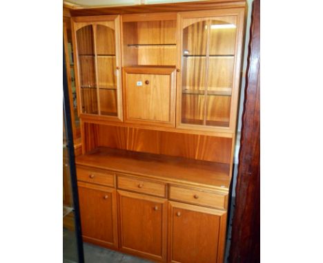 A light mahogany glazed bookcase