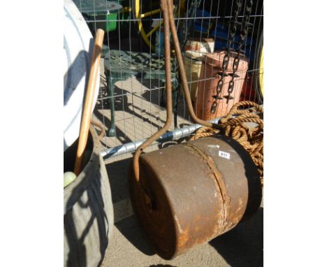 An old metal garden roller