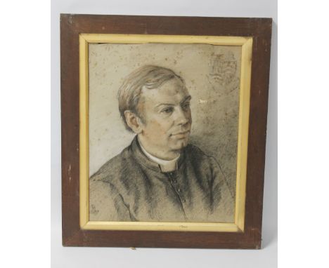 A FRAMED PASTEL PORTRAIT OF A CLERGYMAN, signed to the lower left. Frame size approx 56cm x 65cm A/F