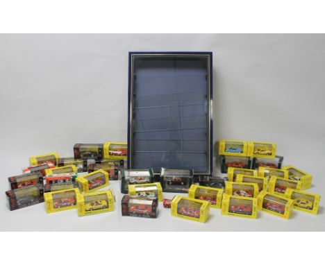 A COLLECTION OF BOXED 1:43 SCALE FERRARI DIECAST CARS BY BANG, starter, detail cars, and classico, together with a wall mount