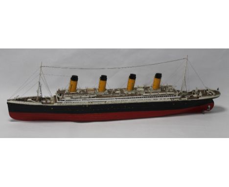 A HAND BUILT MODEL OF THE TITANIC, hand finished and painted. 108cm length 