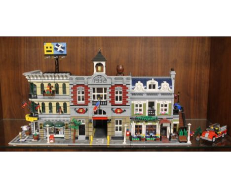 THREE MADE LEGO BUILDINGS, to include 'Fire Station', 'Chez Albert' hotel, 'Corner Shop' together with various figures, acces