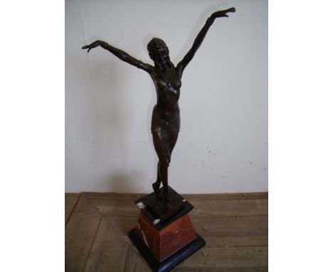 1920's style bronze figure of a semi-clad dancing girl on raised marble base (height 54cm)