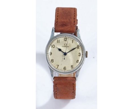 Omega World War II military issue wristwatch, the signed white dial with Arabic numerals and outer minutes track, the casebac