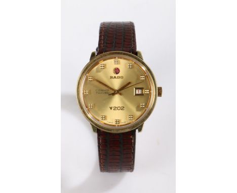 Rado Cosmo-Travel V202 gentleman's gilt cased wristwatch, ref. 11851, the signed gilt dial with square markers, date aperture
