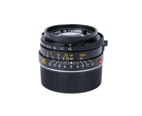 A Leitz Summicron-M f/2 35mm Lens, 1981, black, serial no. 3145881, body, G, some play to aperture ring, elements, VG, some l