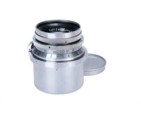 A Carl Zeiss Jena Biotar f/2 42.5mm Lens, Contax RF mount, chrome, serial no. 2404870, body, VG, elements, VG, some light int