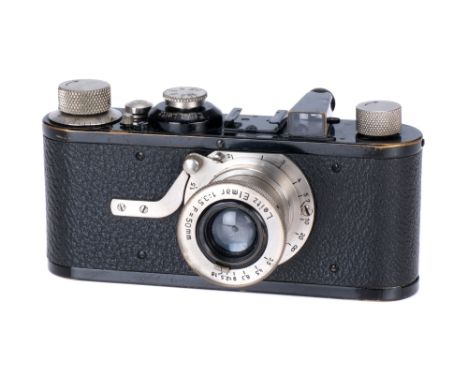 A Leica Ia Camera, 1928, black, serial no. 7607, with Leitz Elmar f/3.5 50mm lens, body, G, shutter working, slowest speeds s