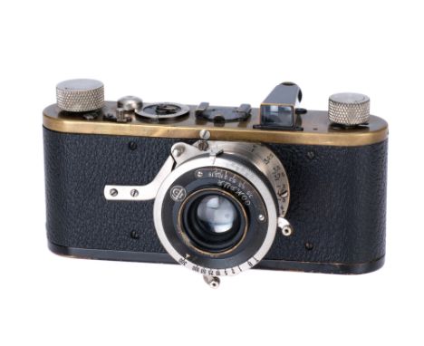 A Leica Ib Compur Camera, 1930, black, serial no. 32709, with Leitz Elmar f/3.5 50mm lens, body, F, paint removed from top pl