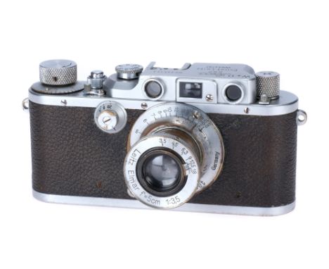 A Leica IIIc 'British War Department' Rangefinder Camera, 1939, chrome, serial no. 335163, with Leitz Elmar f/3.5 50mm lens, 