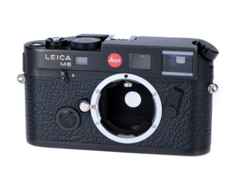 A Leica M6 TTL 0.72 Rangefinder Camera Body, 2000, black, serial no. 2592392, body, G-VG, shutter working, complete with inst