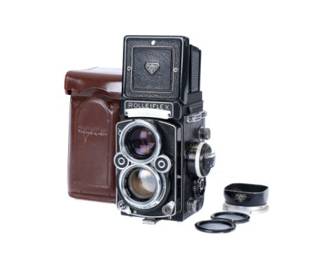 A Rollei Rolleiflex 2.8 F Medium Format TLR Camera, 1960-1981, serial no. 2440220, black &amp; chrome, body G, some paint wea