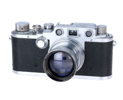 A Leica IIIc Rangefinder Camera, 1945 (last batch), chrome, serial no. 394457, with Leitz Summitar f/2 50mm lens, 1945, chrom