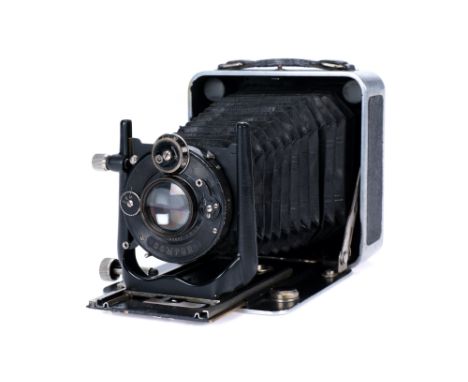 A Kern Bijou 6.5x9cm Camera, 1925, aluminium, with Kern Aarau f/4.5 120mm lens, black, serial no. 1290, body, G, lens, VG, sh