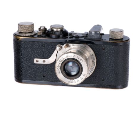 A Leica Ia Close Focus Camera, 1930, black/nickel, serial no. 25249, with Leitz Elmar f/3.5 50mm lens, body, F-G, shutter wor