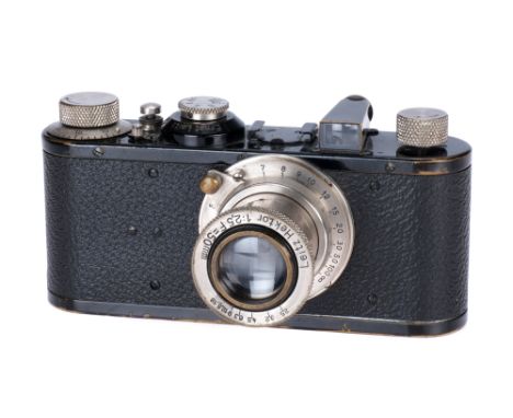 A Leica Ic '`Lutz, Ferrando & Cia' Camera, 1930, black/chrome, serial no. 51479, with Leitz Hektor f/2.5 50mm lens, body, G, 