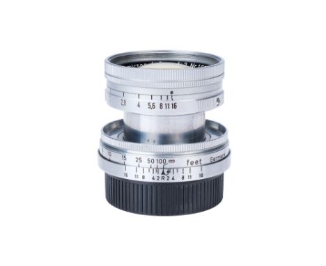 A Leitz Summicron 'Thorium' f/2 50mm Lens, 1953, chrome, serial no. 1020988, body, G-VG, elements, VG-E