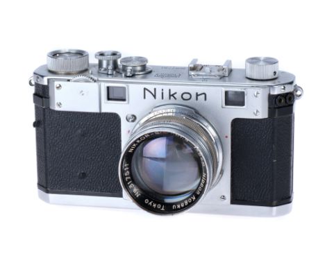 A Nikon S Rangefinder Camera, 1951-54, chrome, serial no. 6097730, with Nikon Nikkor-S.C. f/1.4 50mm lens, chrome, serial no.