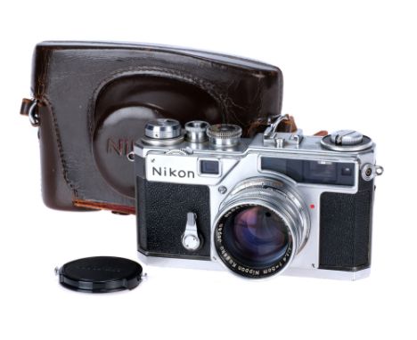 A Nikon SP Rangefinder Camera, 1957-64, chrome, serial no. 6204973, with Nikon Nikkor-S.C f/1.4 50mm lens, chrome, serial no.