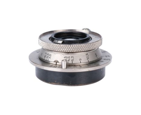 A Leitz Elmar f/3.5 35mm Lens, 1935, nickel, serial no. 225223, body, VG, elements, VG-E, complete with maker's caps