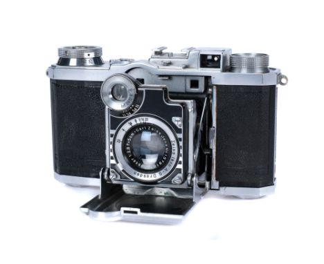 A Zeiss Ikon Super Nettel II (537/24) Rangefinder Camera, 1936-38, chrome, serial no. B22945, with Carl Zeiss Jena Tessar f/2