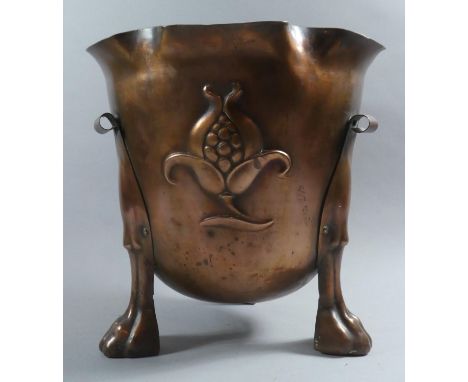 An Art Nouveau Copper Planter with Three Claw Supports and Repousse Stylised Fruit Decoration, 30cm Diameter and 29cm High 