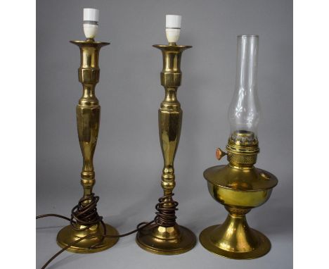 A Pair of Tall Brass Table Lamp Bases, 48cm high Together with an Oil Lamp 