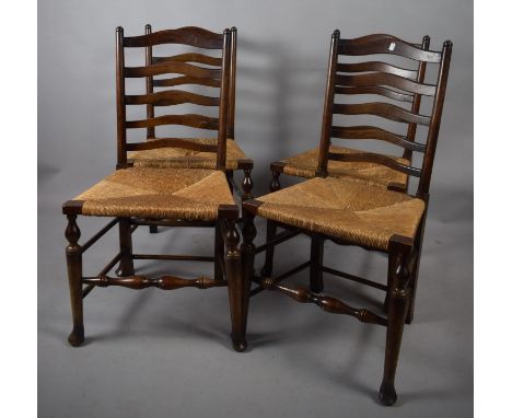 A Set of Four Rush Seated Ladder Back Dining Chairs 