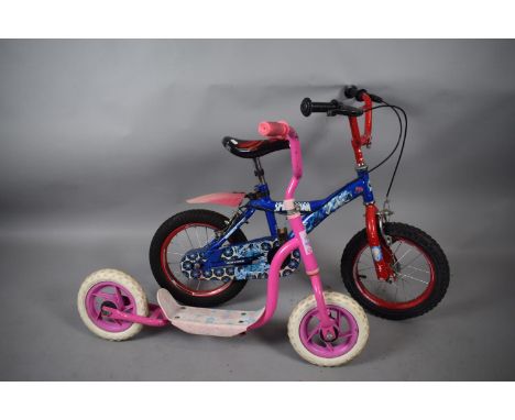 A Child's Superman Bicycle and a Girls Scooter 