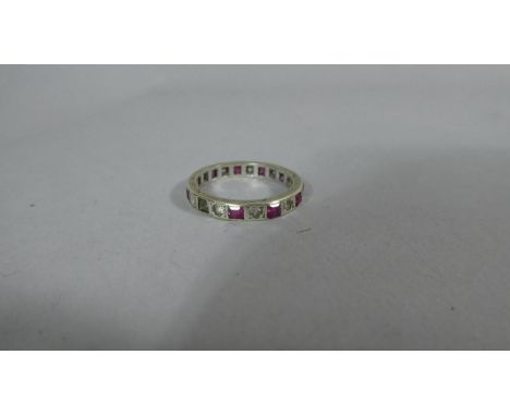 An Art Deco Ruby and White Sapphire Eternity Ring (missing stone) 