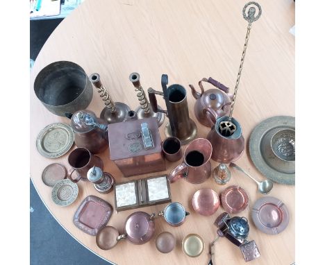 Collection of brass ware  to include candlestick pots jugs and containers.