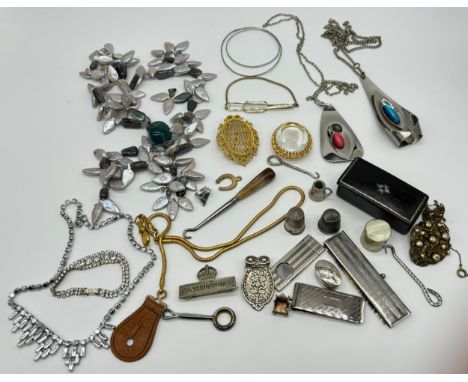 Mixed lot of costume jewellery, cigar cutter and thimbles