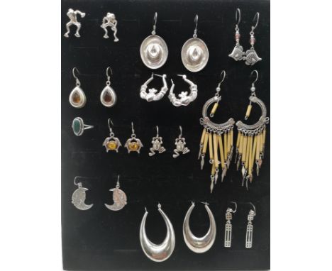 Eleven Pairs of Silver Ear Rings to include a silver ring, Combined Weight 58g.