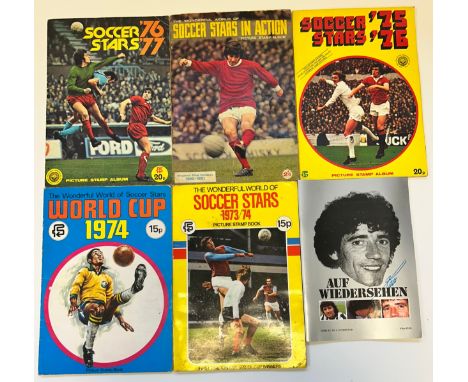 A mixed lot of Soccer star and vehicle books