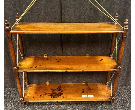 A 19th Century three tier open wall hanging shelf.