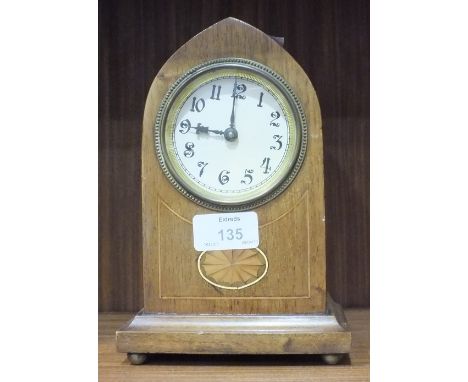 An Edwardian inlaid mahogany lancet shaped mantel clock, 20cm high and a brass standard lamp in the Victorian taste, (2).