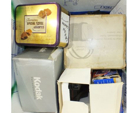 A collection of vintage Polaroid cameras, film, other cameras and related items.