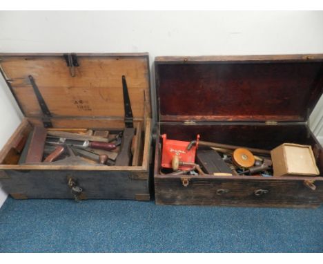 A collection of vintage wood working and other tools to two soft wood chests
