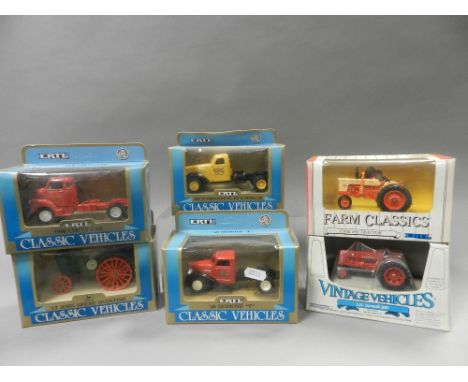 Sixteen boxed Ertl vintage tractors in 1/43 scale subjects include Allis Chalmers, John Deere, Massey Harris and others toget