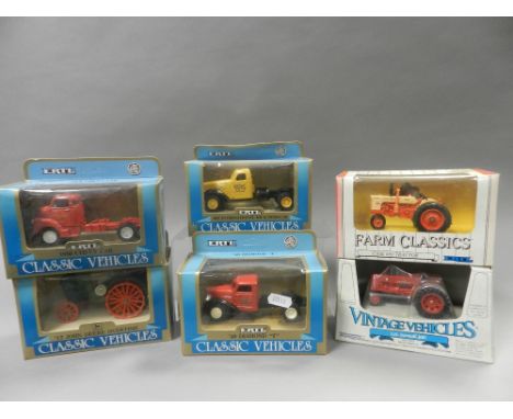 Sixteen boxed Ertl vintage tractors in 1/43 scale subjects include Allis Chalmers, John Deere, Massey Harris and others toget