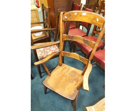 A beech framed ladder back kitchen Windsor chair on ring turned legs, a 1940s oak slat back armchair and a commode chair 
