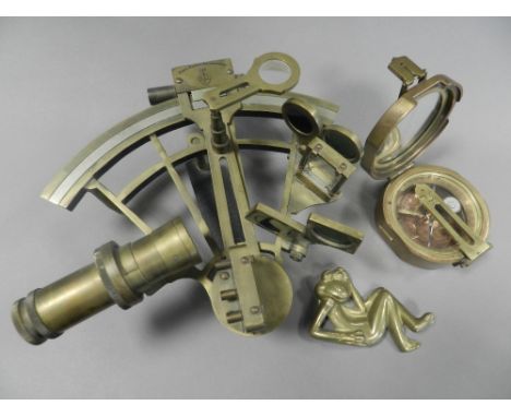 A reproduction brass sextant marked Henry Barrow and Co. London together with a reproduction naval compass