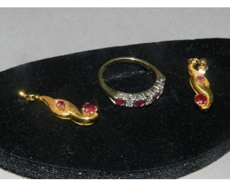 A 9ct gold ruby and diamond half eternity ring together with a pair of ruby set ear pendants